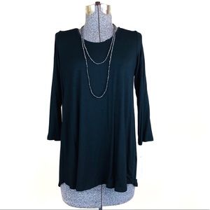 Loveappella Leander Cutout Swing Knit Top in Black